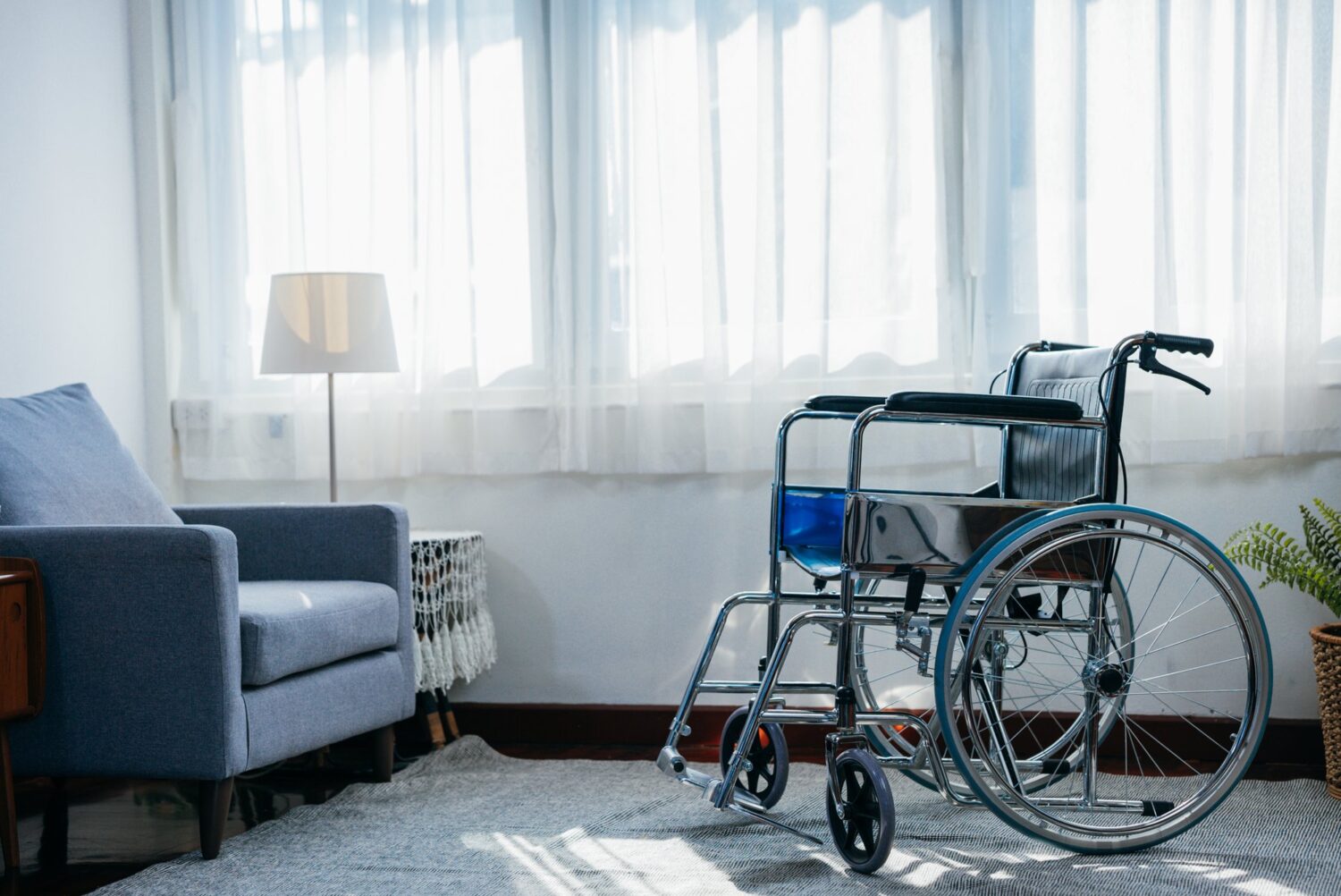 a wheelchair in a nursing home room