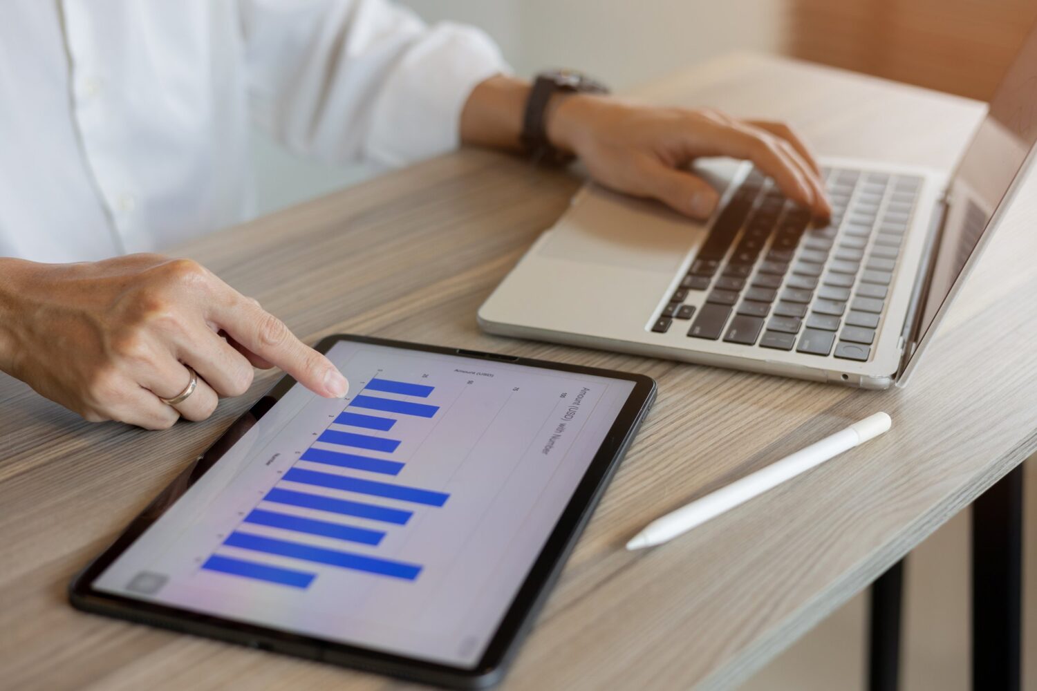a healthcare provider reviewing capital equipment investment numbers