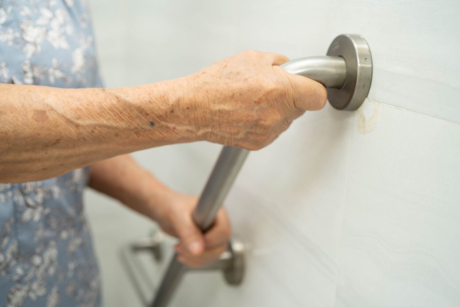 an individual with mobility challenges in a shower